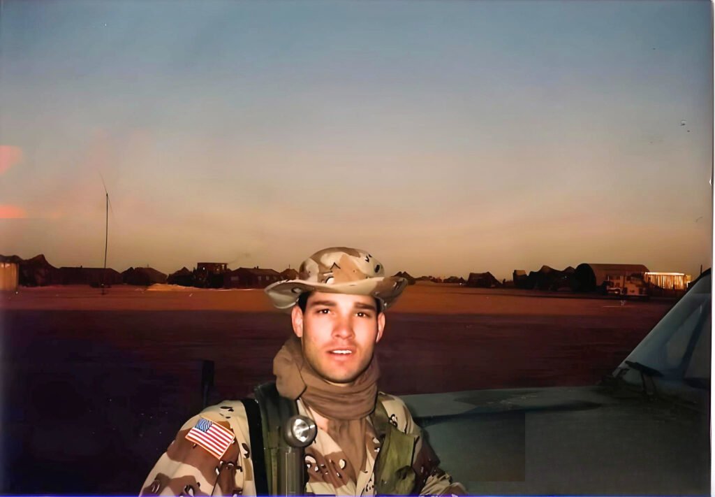 Chris Latam serving in the U.S. Army as a Forward Observer during the Gulf War in Saudi Arabia and Iraq, providing artillery targeting support and earning Air Assault certification.